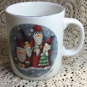 Santa Claus Family Christmas Mug by Elaine Thompson